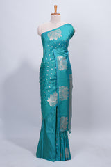 Green floral zari motifs design semi soft silk saree with self border and matching blouse