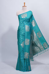 Green floral zari motifs design semi soft silk saree with self border and matching blouse