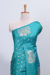 Green floral zari motifs design semi soft silk saree with self border and matching blouse