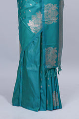 Green floral zari motifs design semi soft silk saree with self border and matching blouse