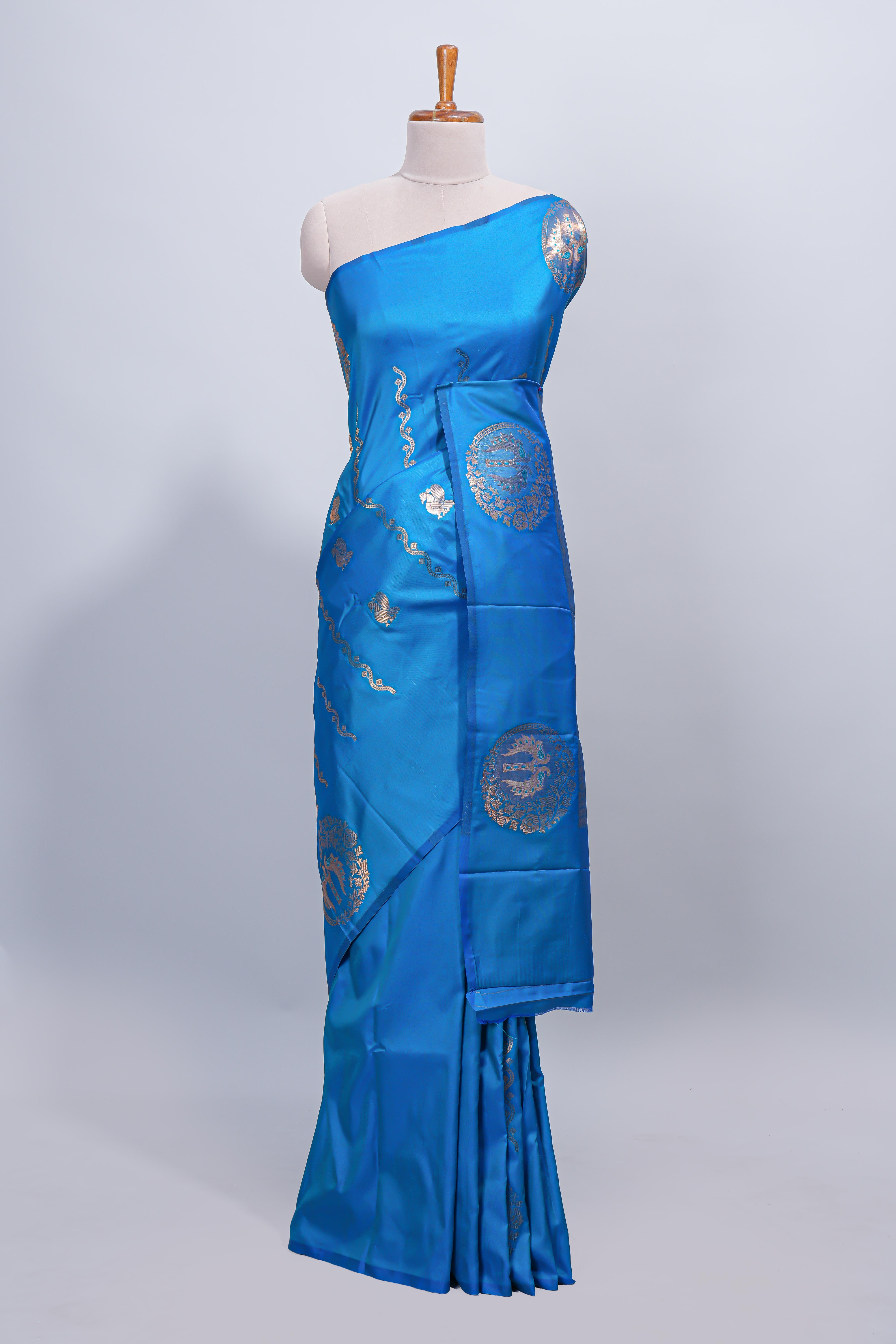 Blue floral zari motifs design semi soft silk saree with self border and matching blouse