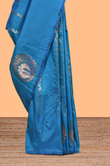 Blue colour Semi soft silk withgold zari floral motifs border with Vaira oosi Design and matching blouse