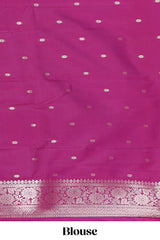 Magenta colour Semi soft silk withgold zari floral motifs border with Peacock Woven Design and matching blouse