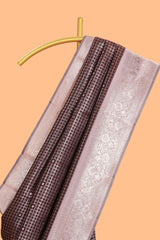 Dark brown checked floral motifs design semi soft silk saree with contrast border and blouse