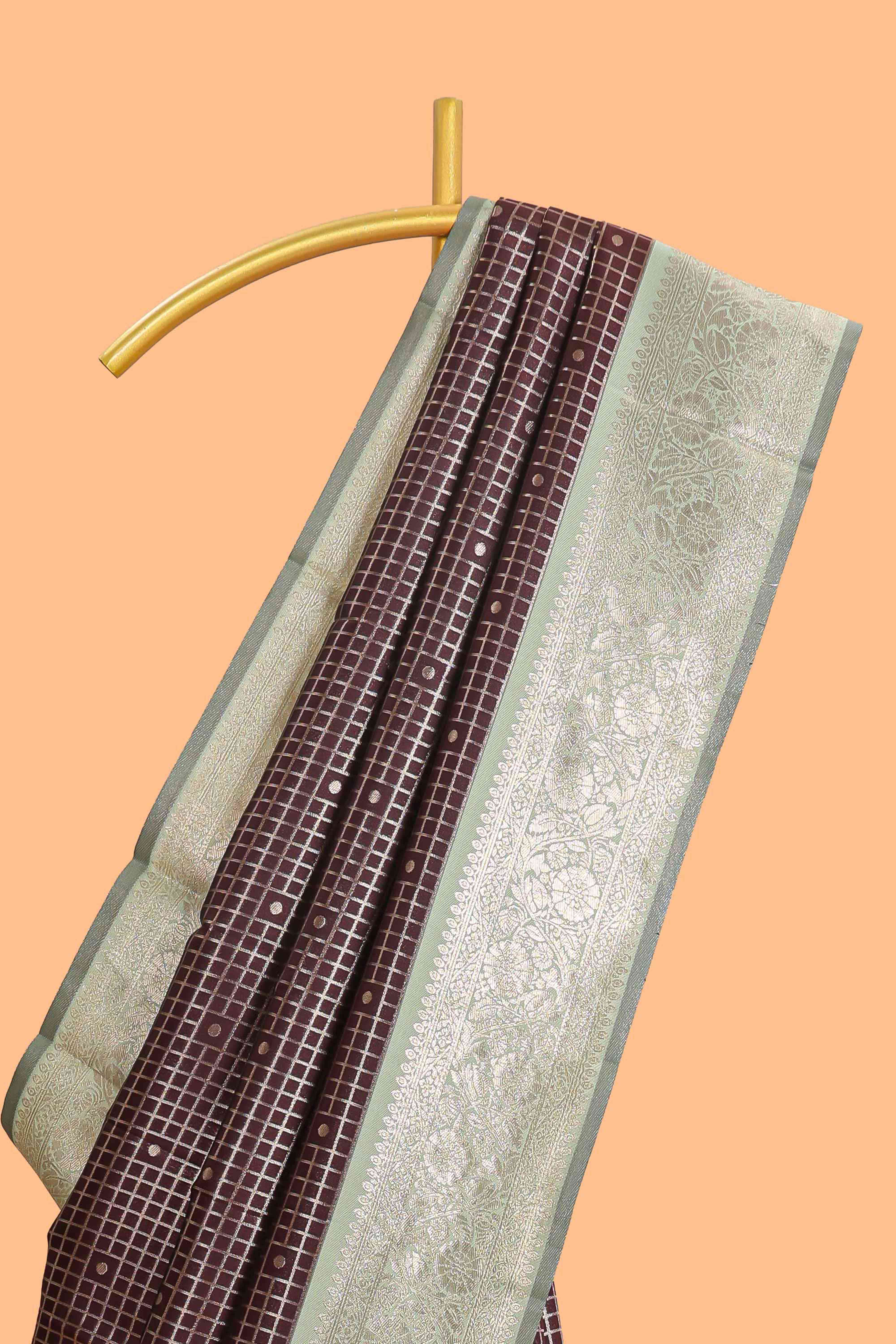 Dark brown checked floral motifs design semi soft silk saree with contrast border and blouse