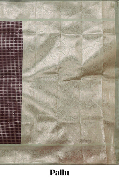 Dark brown checked floral motifs design semi soft silk saree with contrast border and blouse