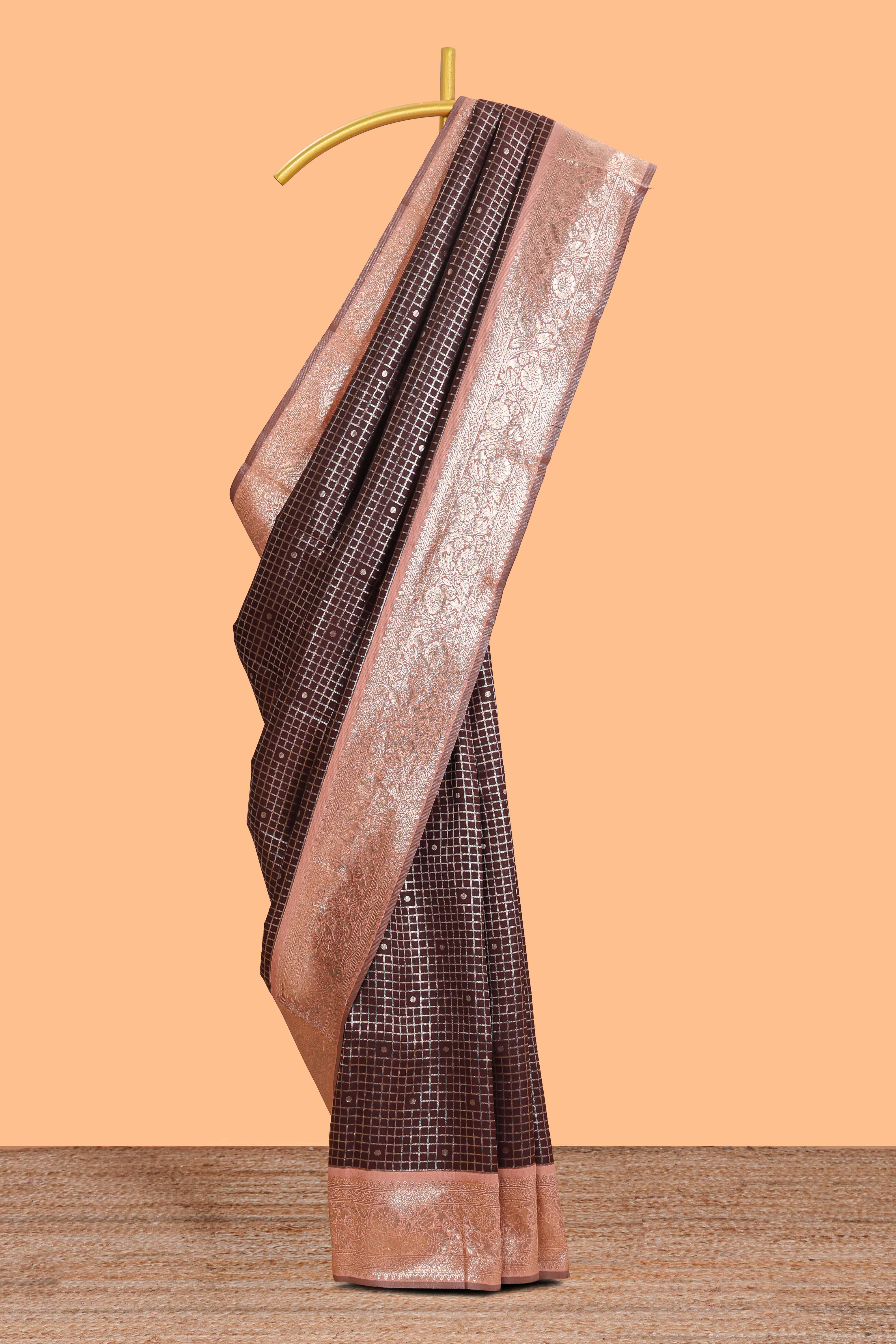 Dark brown checked floral motifs design semi soft silk saree with contrast border and blouse