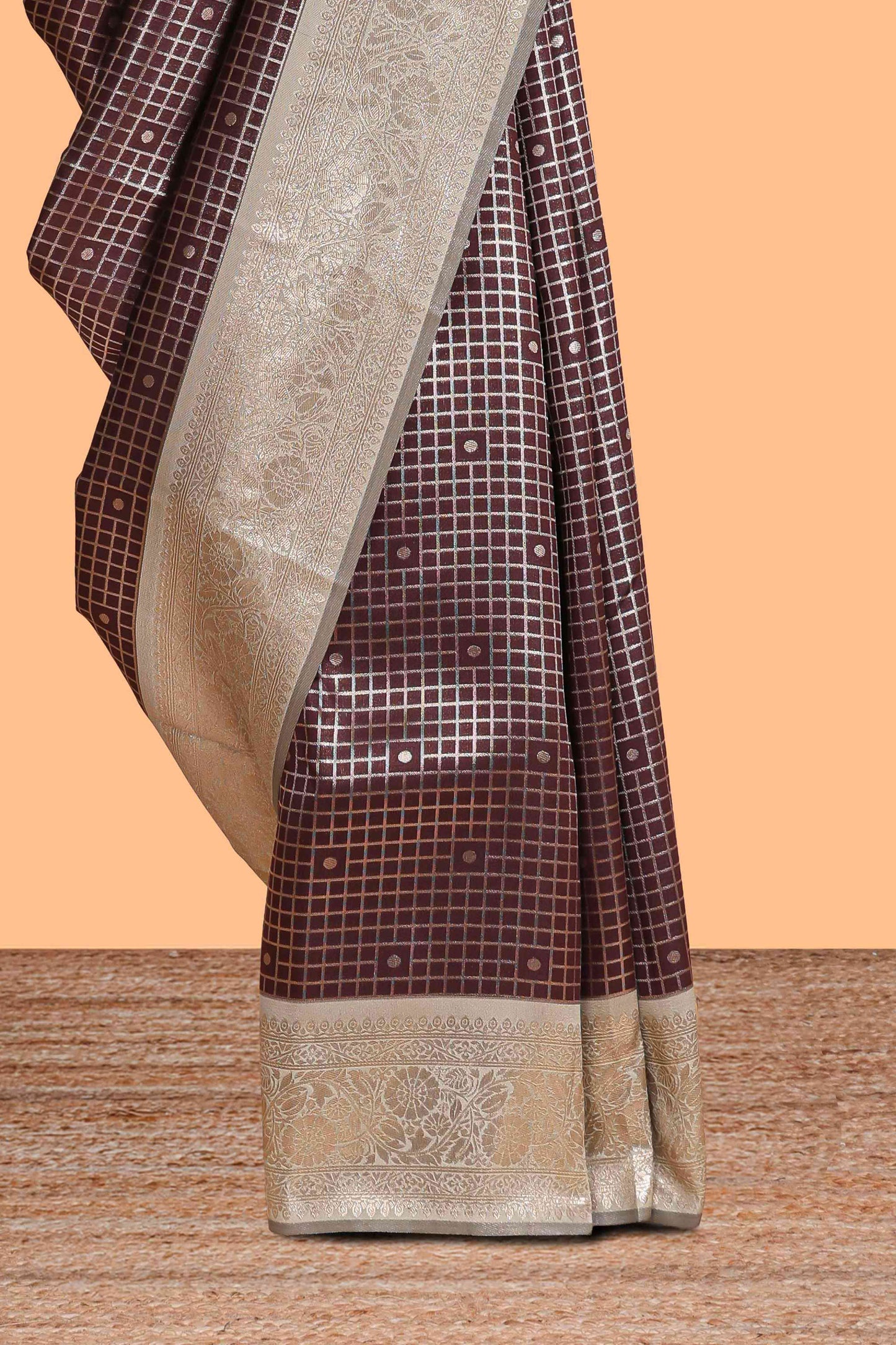 Dark brown checked floral motifs design semi soft silk saree with contrast border and blouse