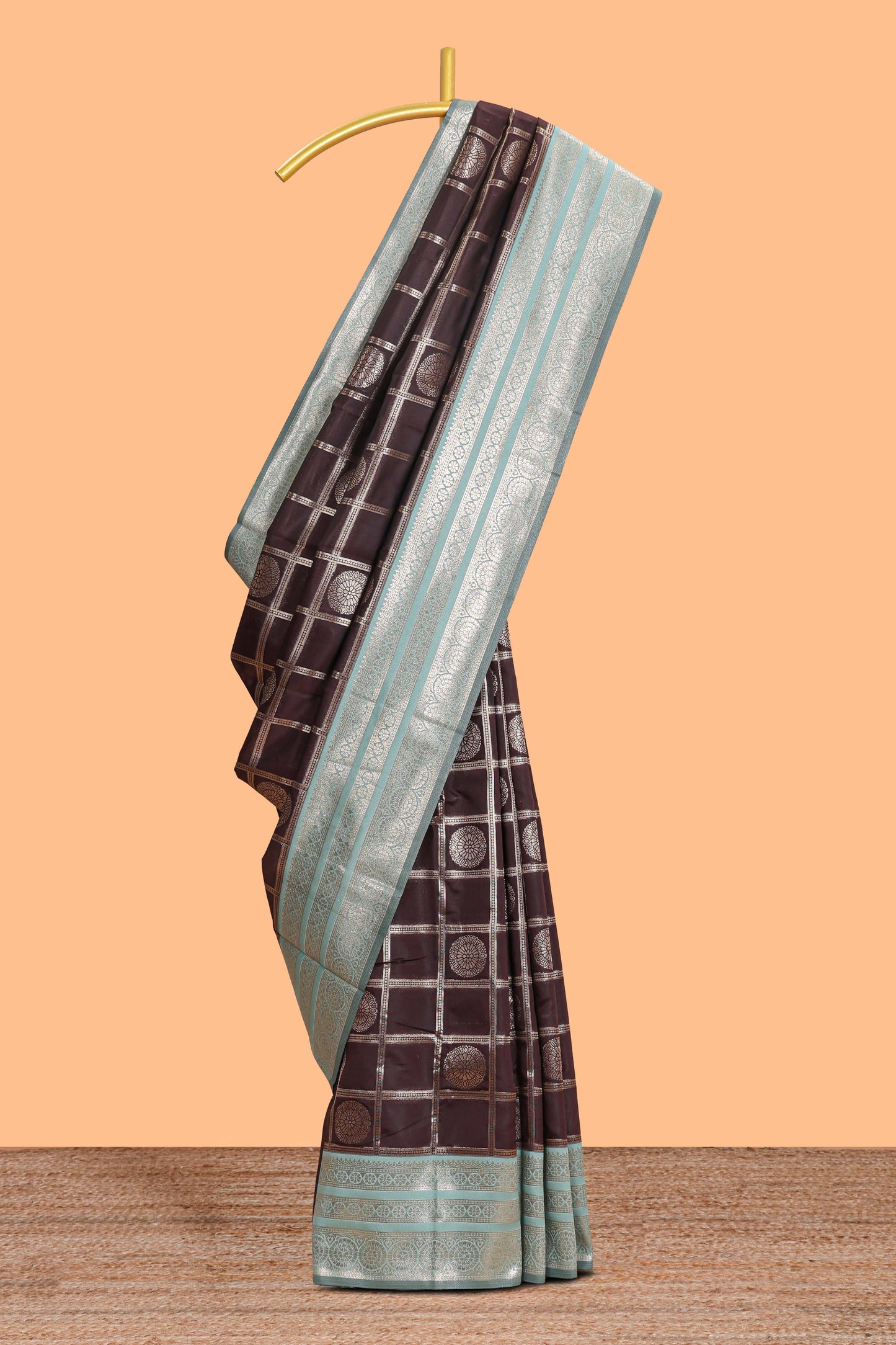 Dark brown checked floral motifs design semi soft silk saree with contrast border and blouse