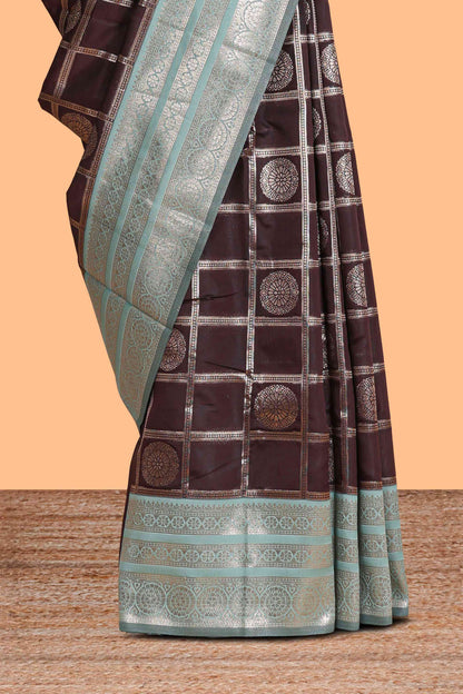 Dark brown checked floral motifs design semi soft silk saree with contrast border and blouse