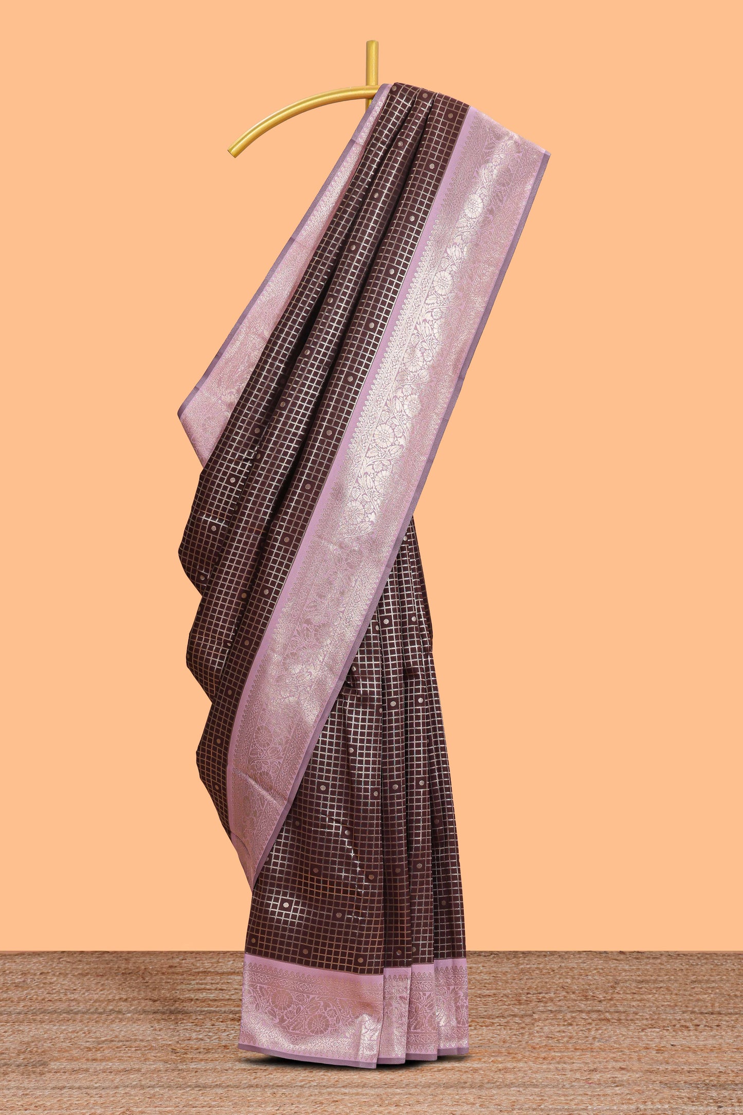 Dark brown checked floral motifs design semi soft silk saree with contrast border and blouse