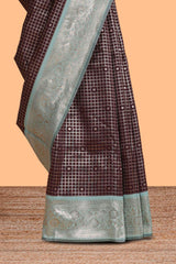 Dark brown checked floral motifs design semi soft silk saree with contrast border and blouse