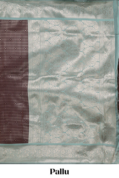 Dark brown checked floral motifs design semi soft silk saree with contrast border and blouse