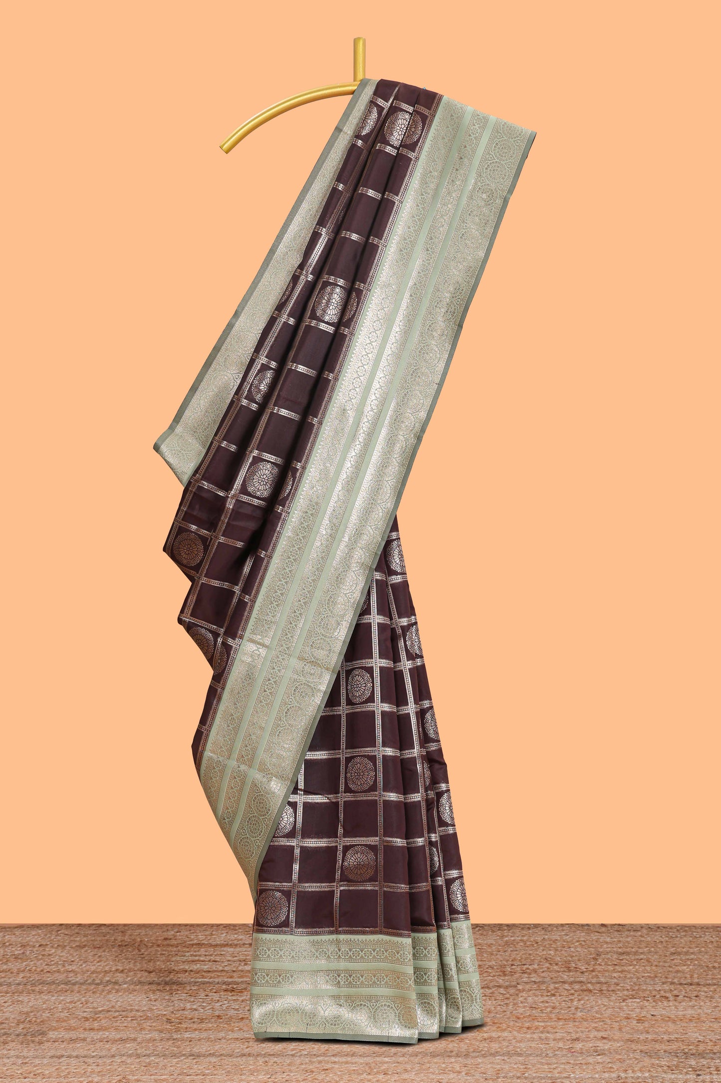 Dark brown checked floral motifs design semi soft silk saree with contrast border and blouse