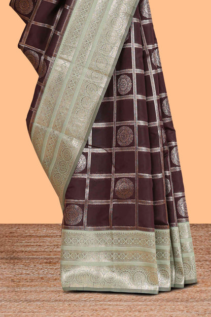 Dark brown checked floral motifs design semi soft silk saree with contrast border and blouse