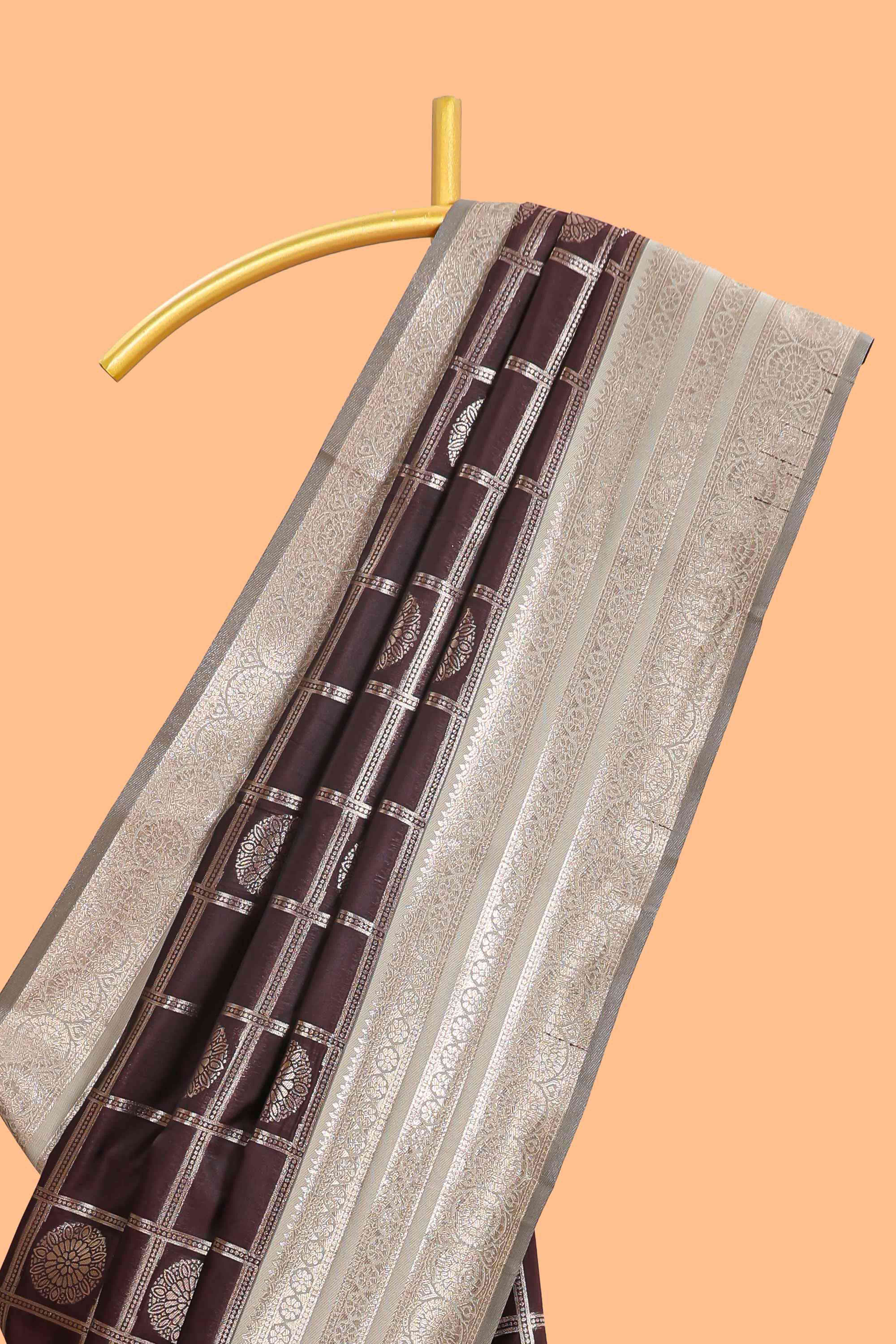 Dark brown checked floral motifs design semi soft silk saree with contrast border and blouse