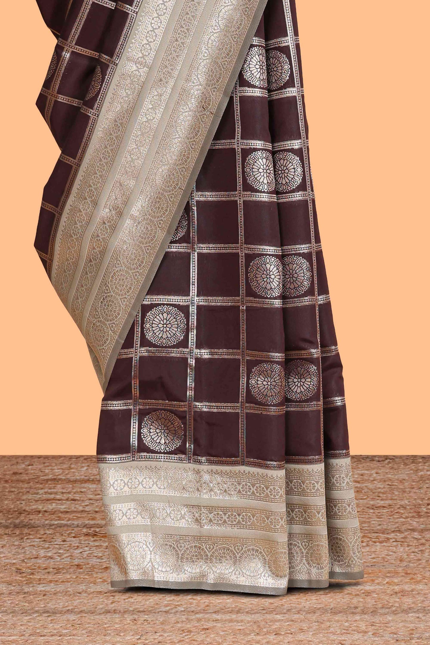 Dark brown checked floral motifs design semi soft silk saree with contrast border and blouse