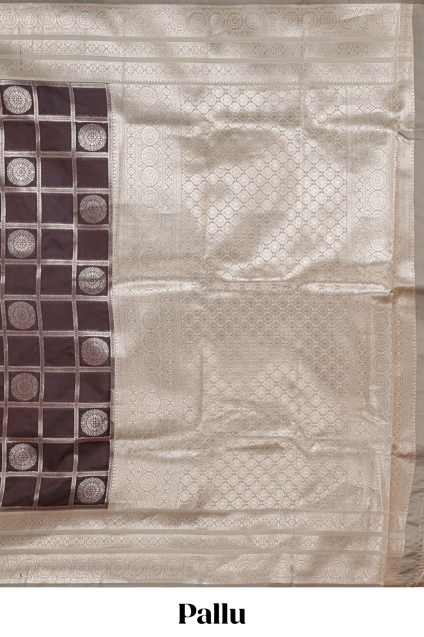 Dark brown checked floral motifs design semi soft silk saree with contrast border and blouse