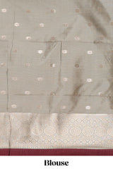 Dark brown checked floral motifs design semi soft silk saree with contrast border and blouse