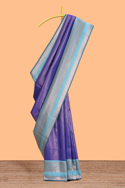 Blue checked floral motifs design semi soft silk saree with contrast border and blouse