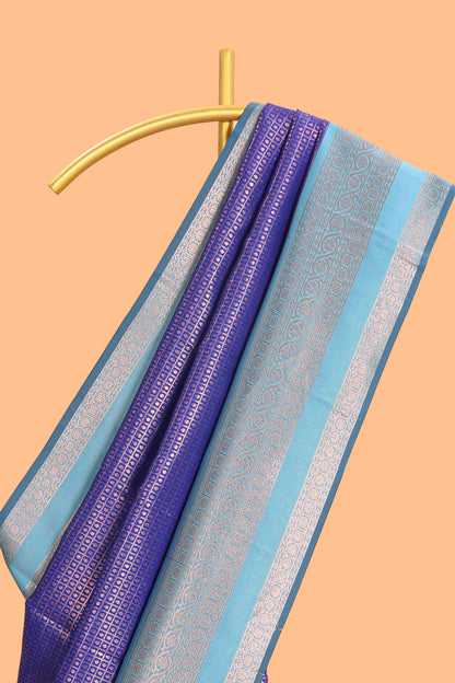 Blue checked floral motifs design semi soft silk saree with contrast border and blouse