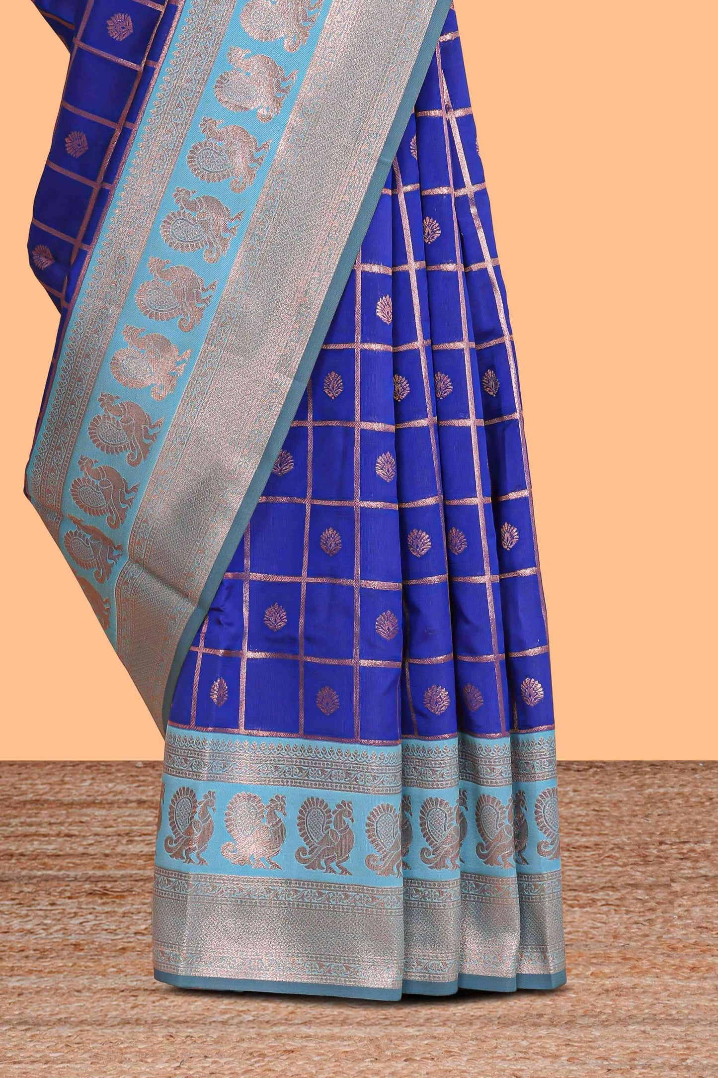 Blue checked floral motifs design semi soft silk saree with contrast border and blouse