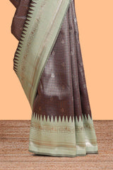Dark brown zari checked design semi soft silk saree with contrast border and blouse