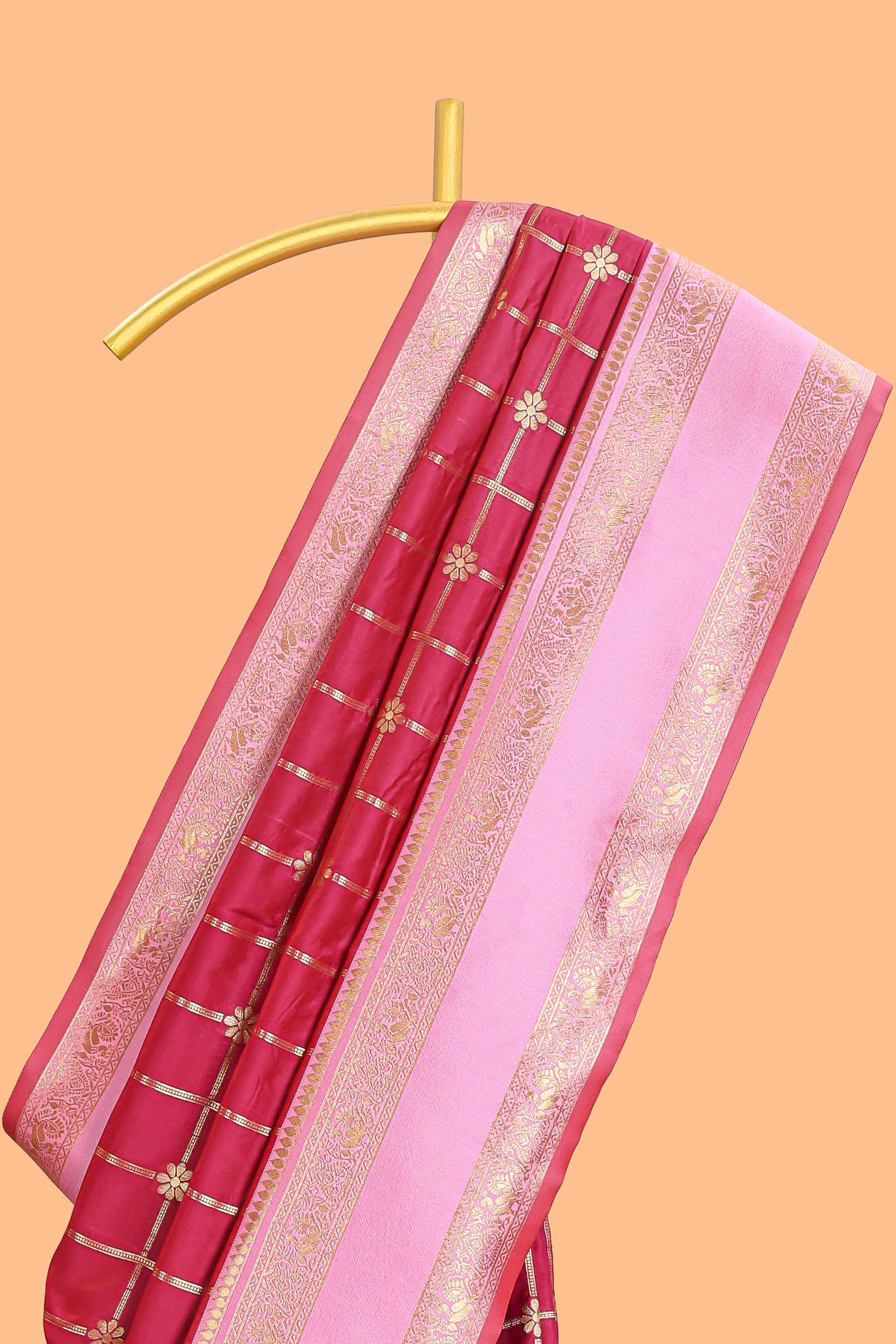 Maroon checked floral zari design semi soft silk saree with contrast bentex border and floral motifs blouse