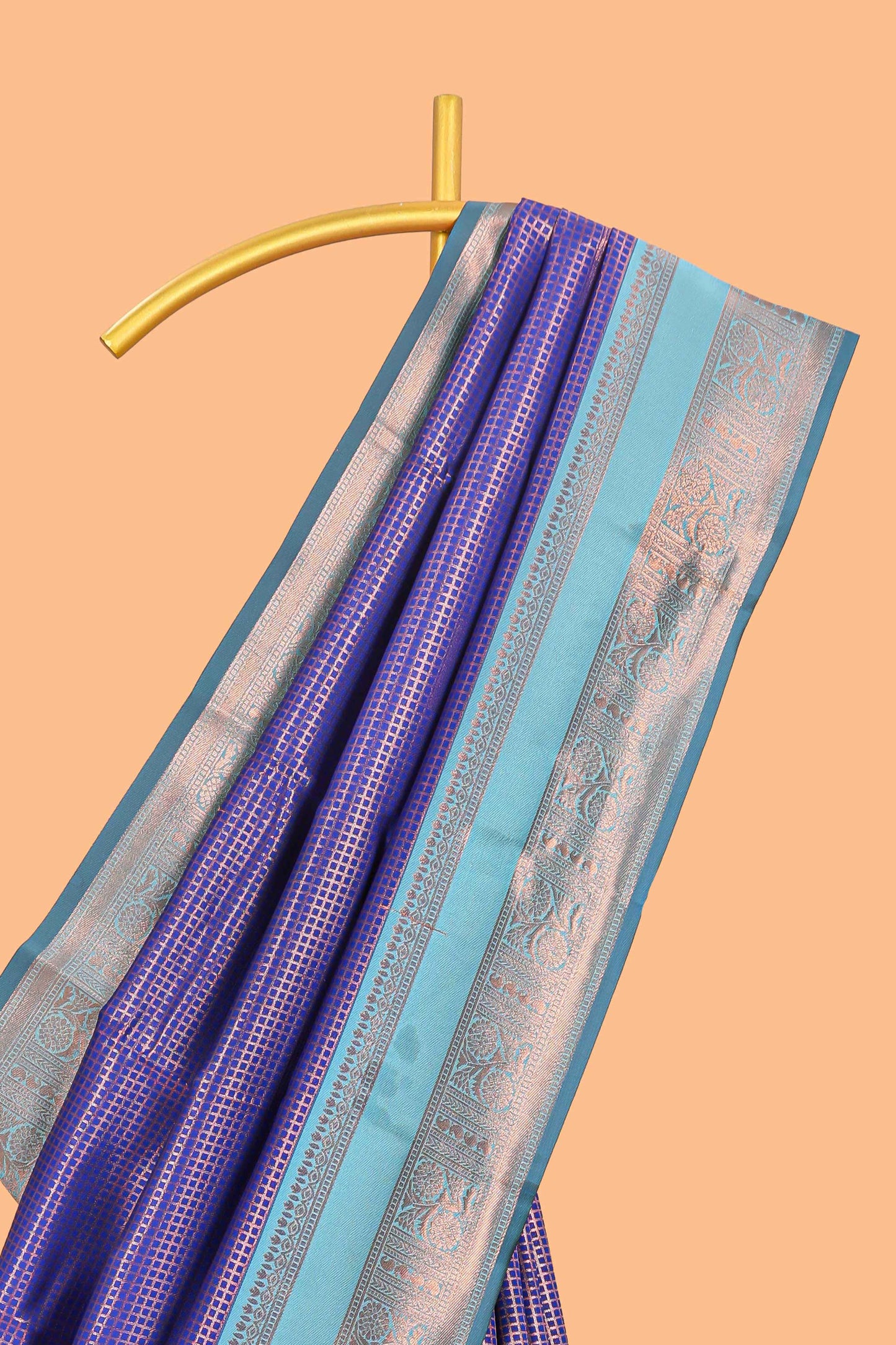 Blue checked floral motifs design semi soft silk saree with contrast zari border and floral motifs blouse