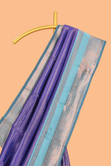 Blue checked floral motifs design semi soft silk saree with contrast zari border and floral motifs blouse