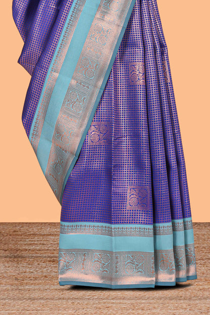 Blue checked floral motifs design semi soft silk saree with contrast zari border and floral motifs blouse