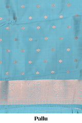 Blue checked floral motifs design semi soft silk saree with contrast zari border and floral motifs blouse