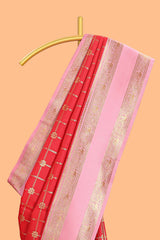 Red checked floral zari design semi soft silk saree with contrast bentex border and floral motifs blouse