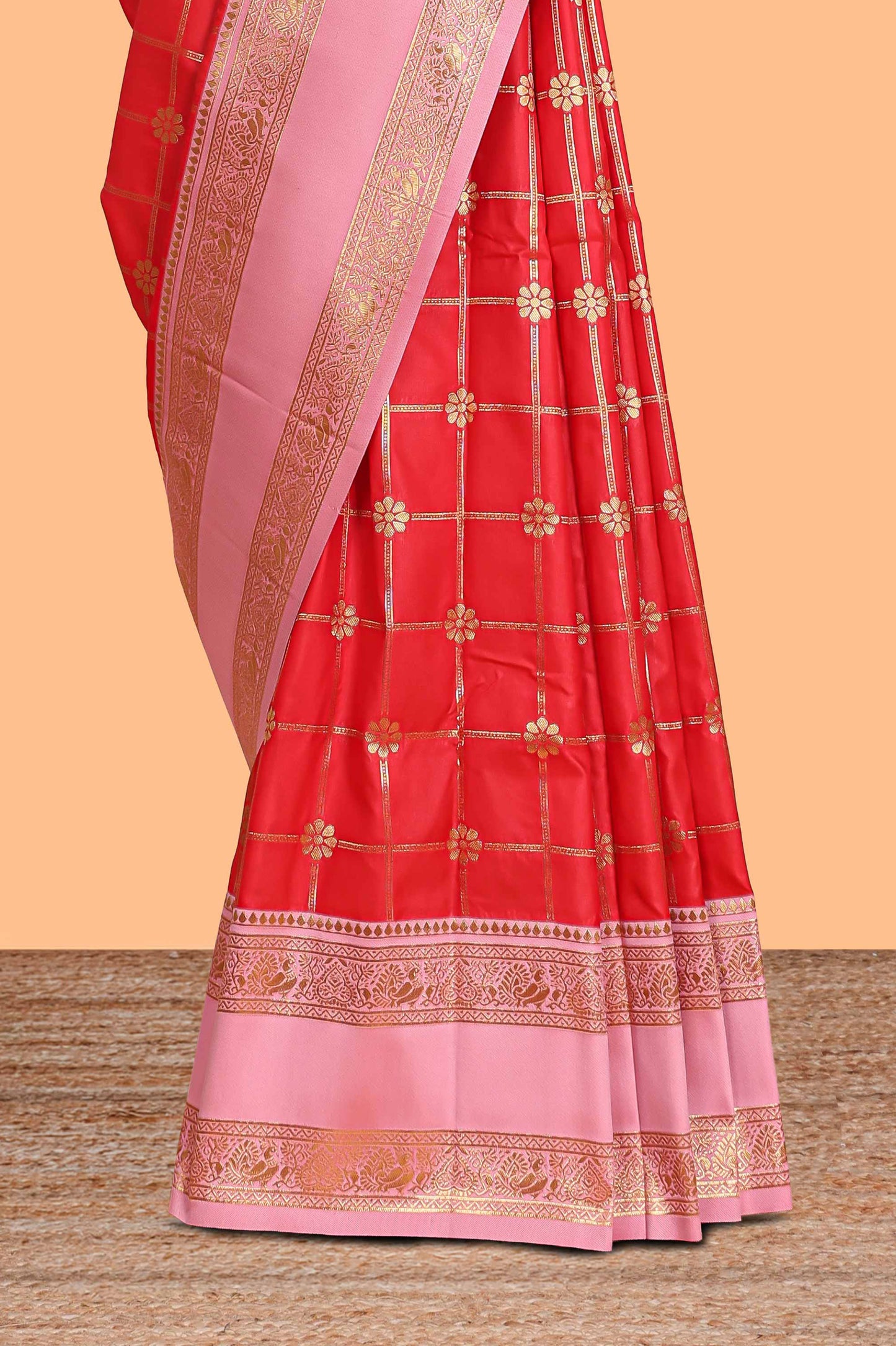 Red checked floral zari design semi soft silk saree with contrast bentex border and floral motifs blouse