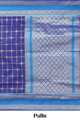 Blue checked floral zari design semi soft silk saree with contrast bentex border and floral motifs blouse