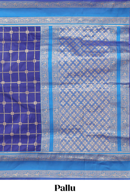Blue checked floral zari design semi soft silk saree with contrast bentex border and floral motifs blouse