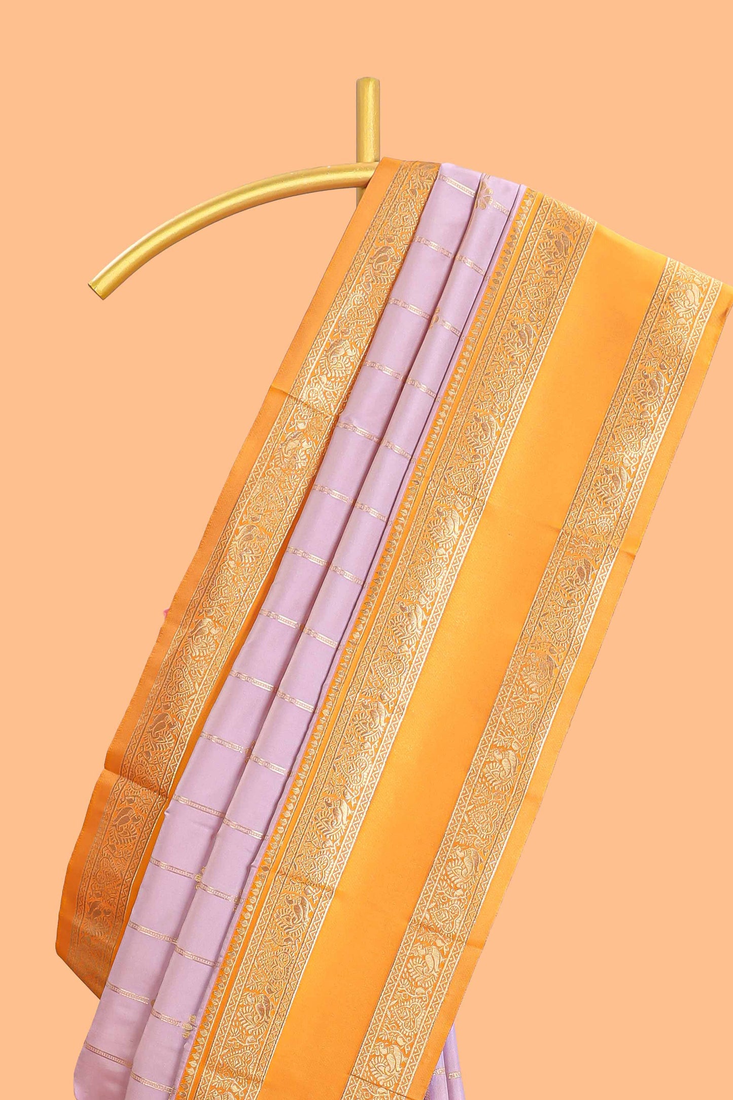 Pale lavender checked floral zari design semi soft silk saree with contrast bentex border and floral motifs blouse