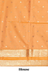 Cream checked floral zari design semi soft silk saree with contrast bentex border and floral motifs blouse