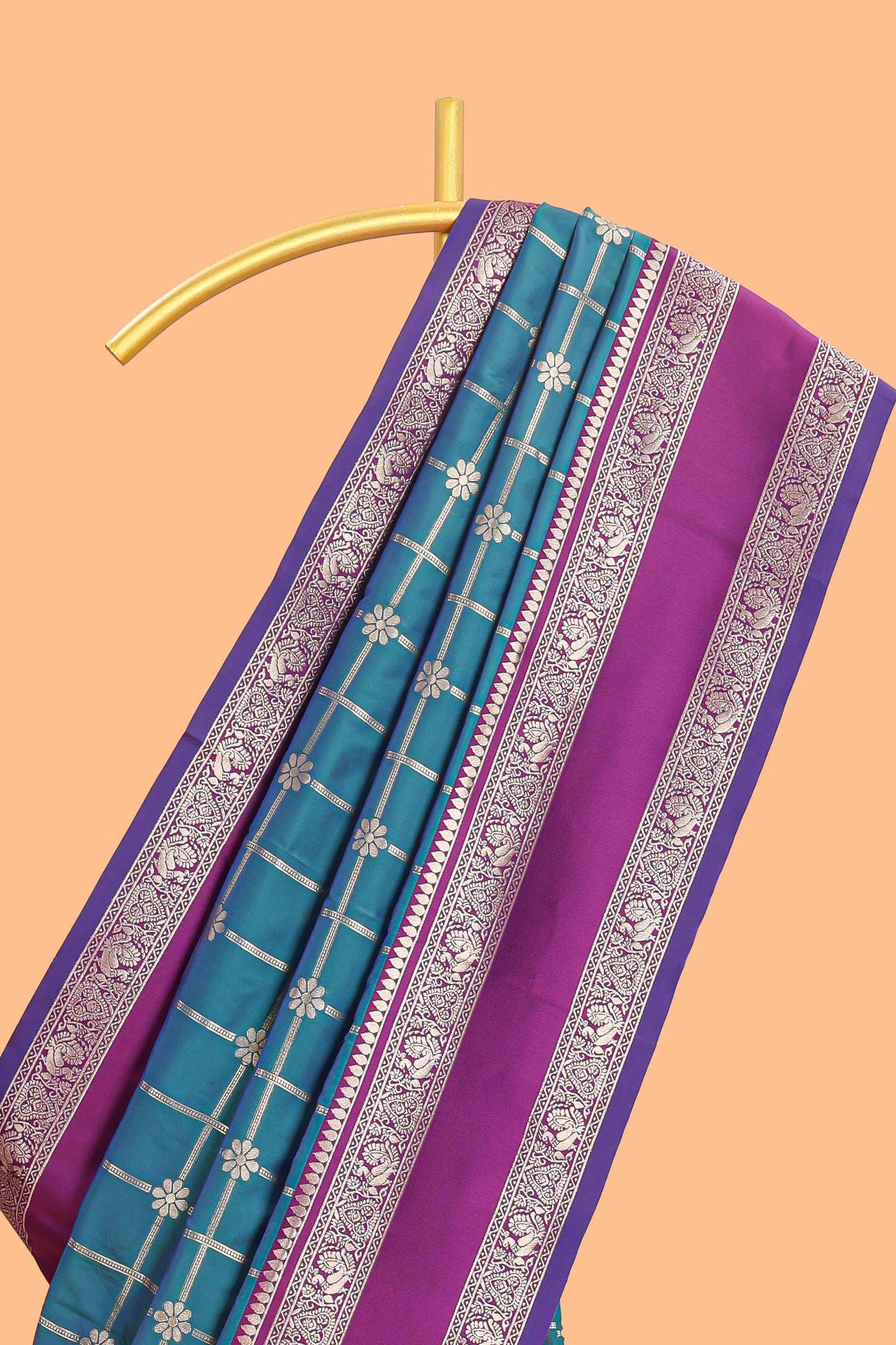 Green checked floral zari design semi soft silk saree with contrast bentex border and floral motifs blouse
