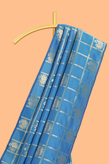 Borderless blue checked floral motifs zari design semi soft silk saree with matching zari motifs blouse