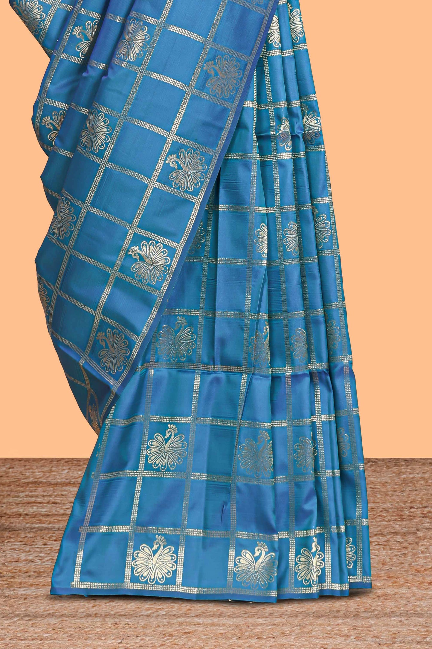 Borderless blue checked floral motifs zari design semi soft silk saree with matching zari motifs blouse