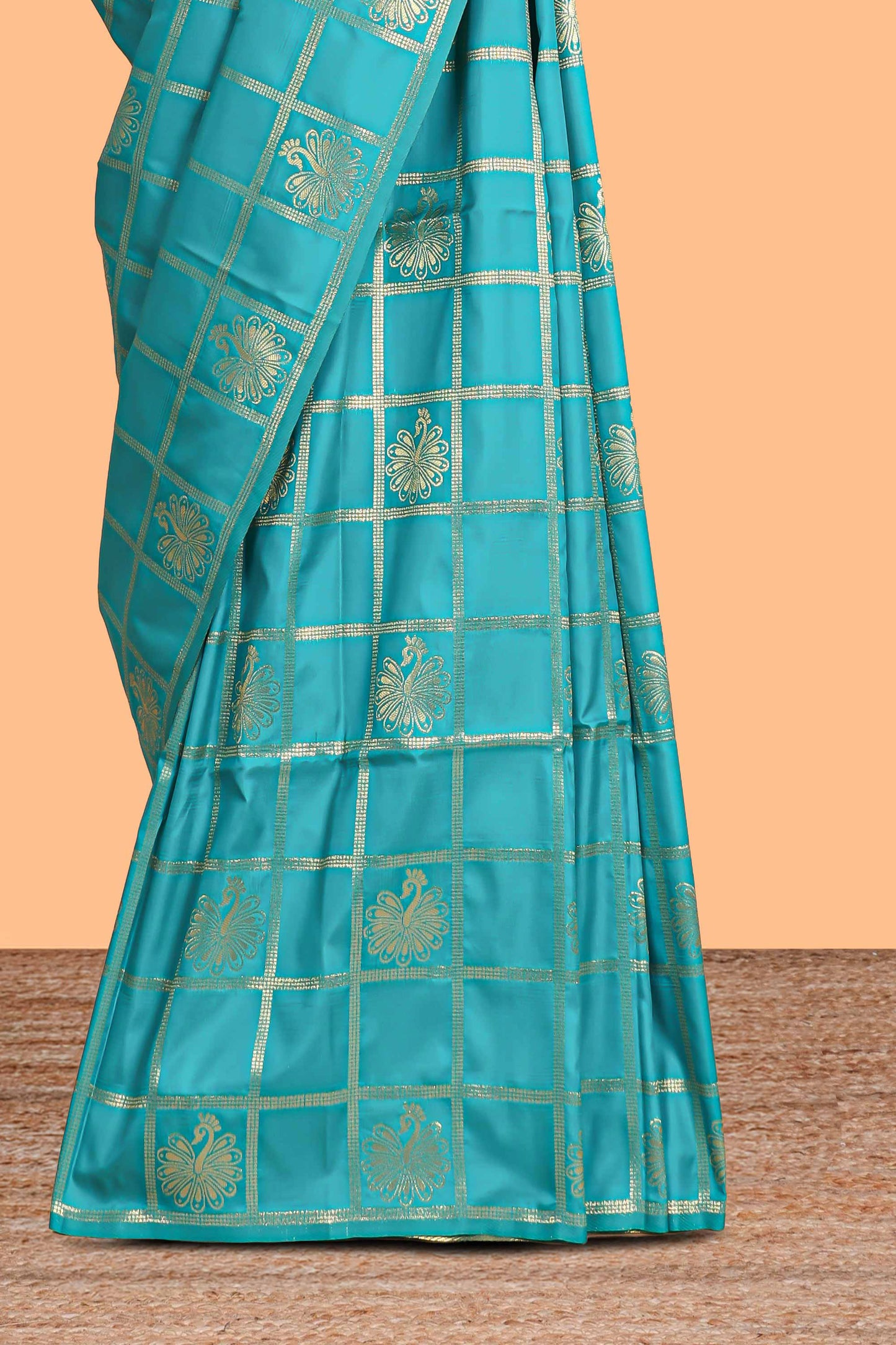 Borderless green checked floral motifs zari design semi soft silk saree with matching zari motifs blouse