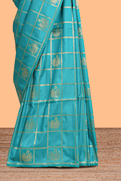 Borderless green checked floral motifs zari design semi soft silk saree with matching zari motifs blouse