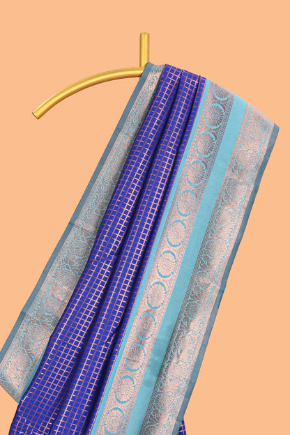 Blue checked semi soft silk saree with contrast zari border and floral motifs blouse