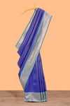Blue checked & dotted motifs semi soft silk saree with contrast zari border and floral motifs blouse