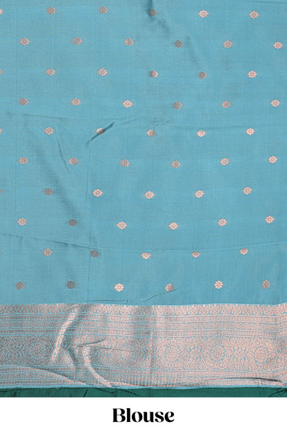 Blue checked floral design motifs semi soft silk saree with contrast zari border and floral motifs blouse