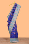 Blue checked floral design motifs semi soft silk saree with contrast zari border and floral motifs blouse