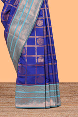 Blue checked floral design motifs semi soft silk saree with contrast zari border and floral motifs blouse