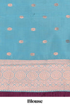 Blue checked floral design motifs semi soft silk saree with contrast zari border and floral motifs blouse