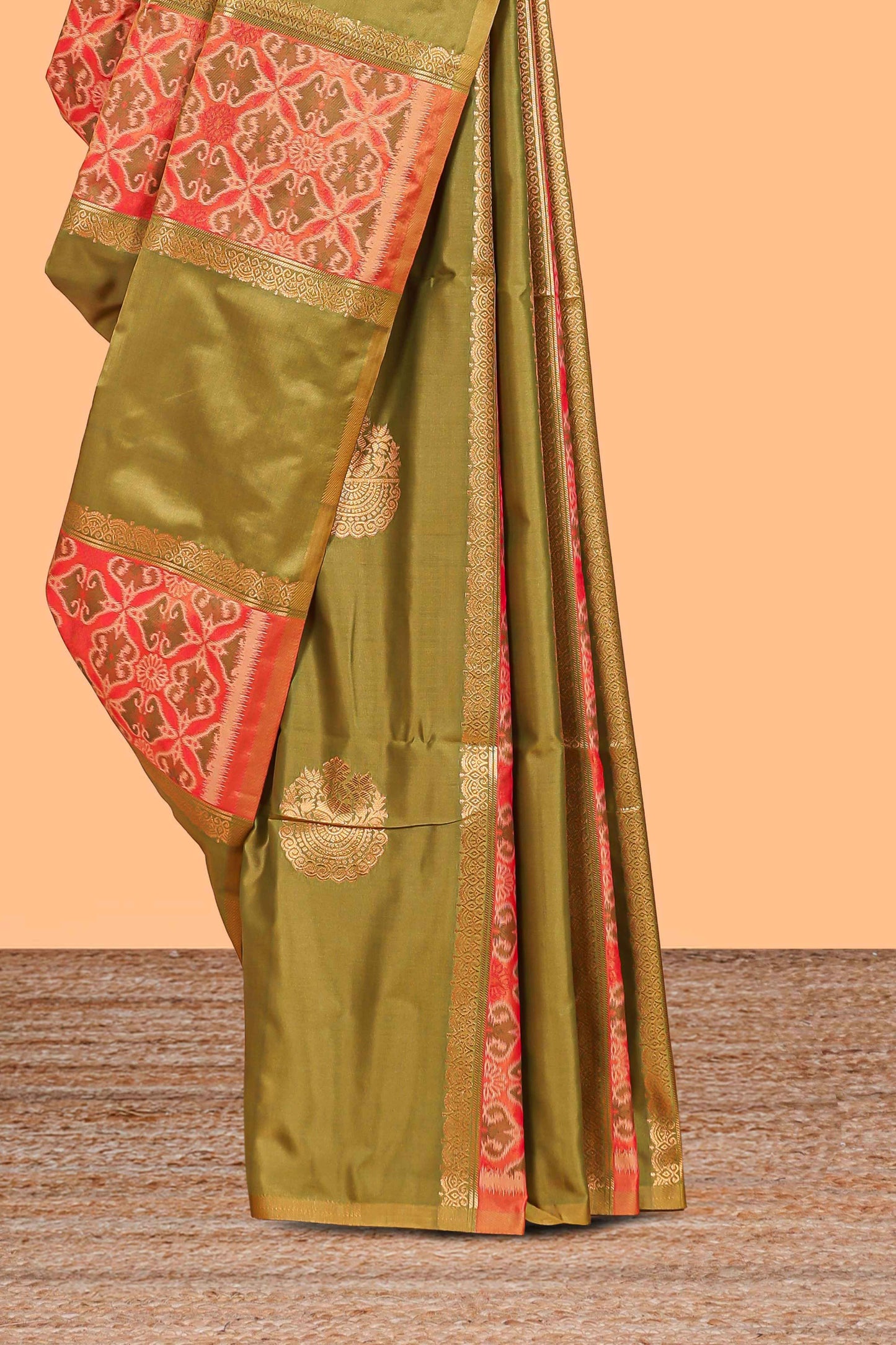 Green semi soft silk saree patola printed body with zari border and rich contrast pallu with contrast blouse